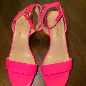 Neon pink low heeled shoes